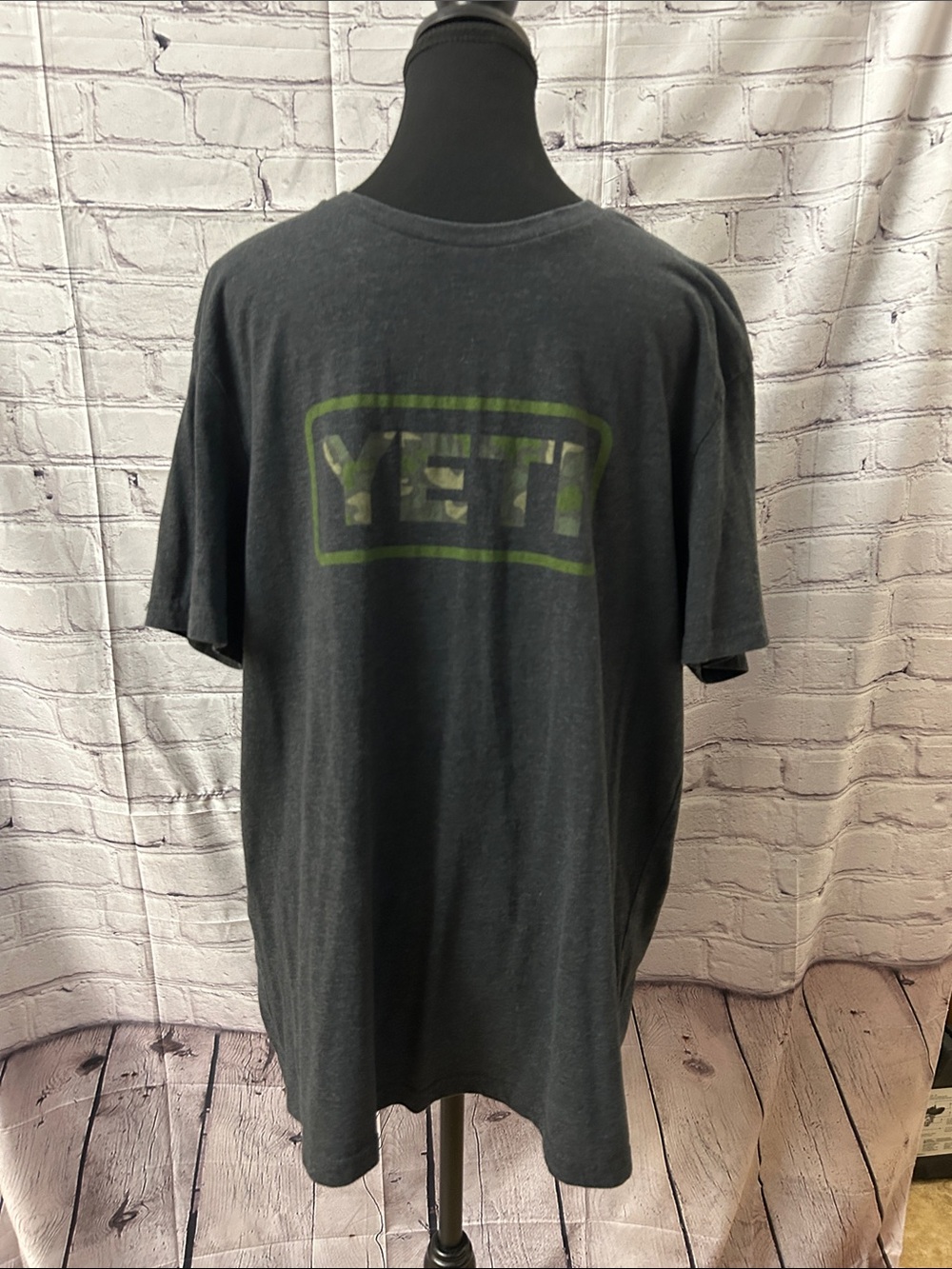 Yeti Dark Gray Short Sleeve Tee with Green Logo